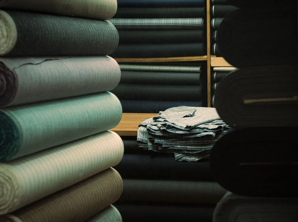 Folded fabrics and rolls of textiles in an Istanbul warehouse